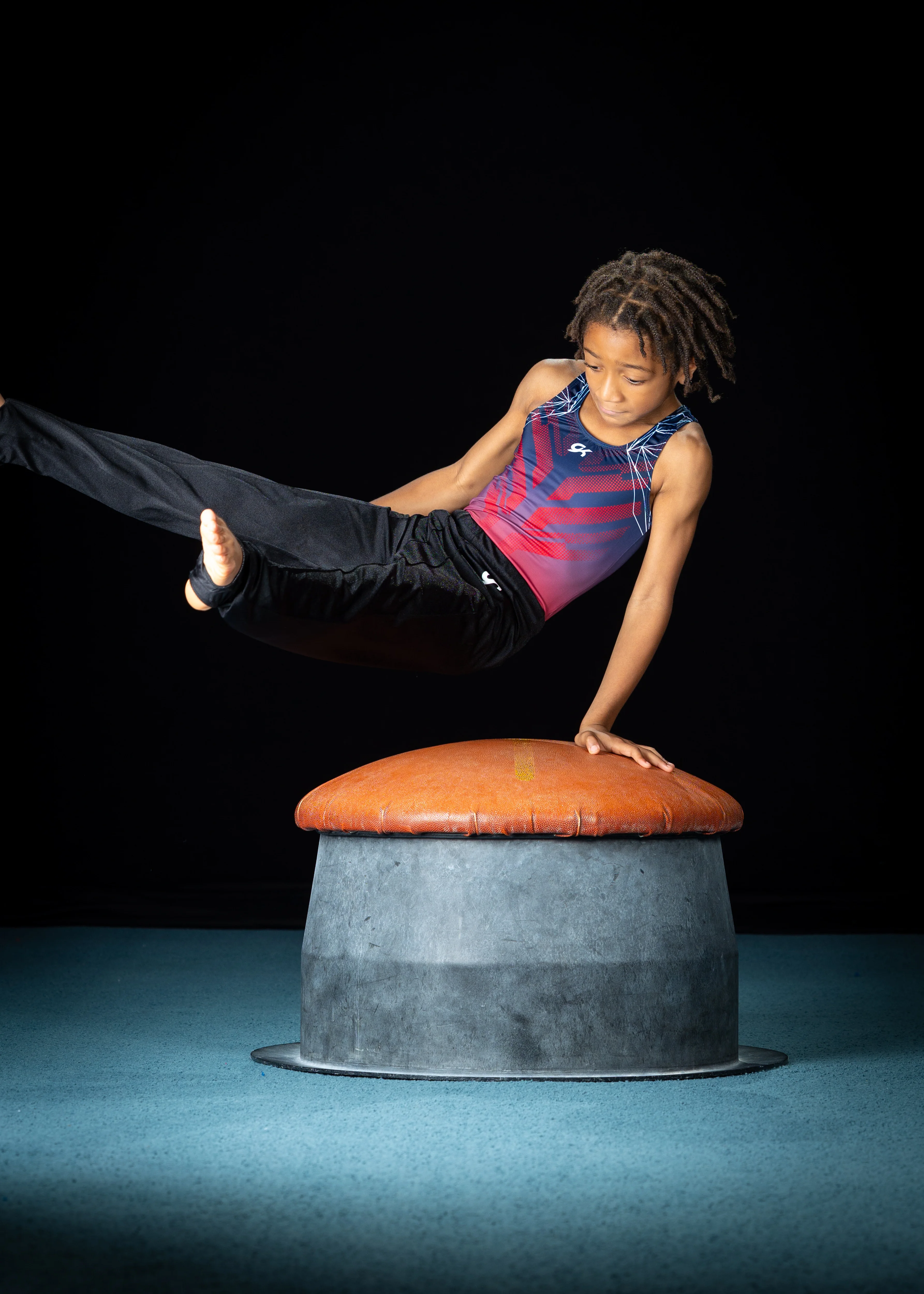Male gymnast on mushroom